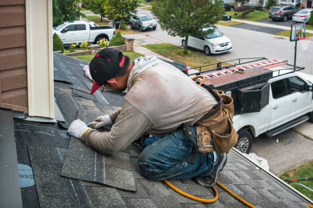 Professional Roofing technician working in Chincoteague Island, VA